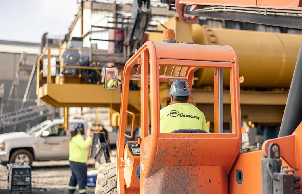 Morgan Site Services team member driving equipment.